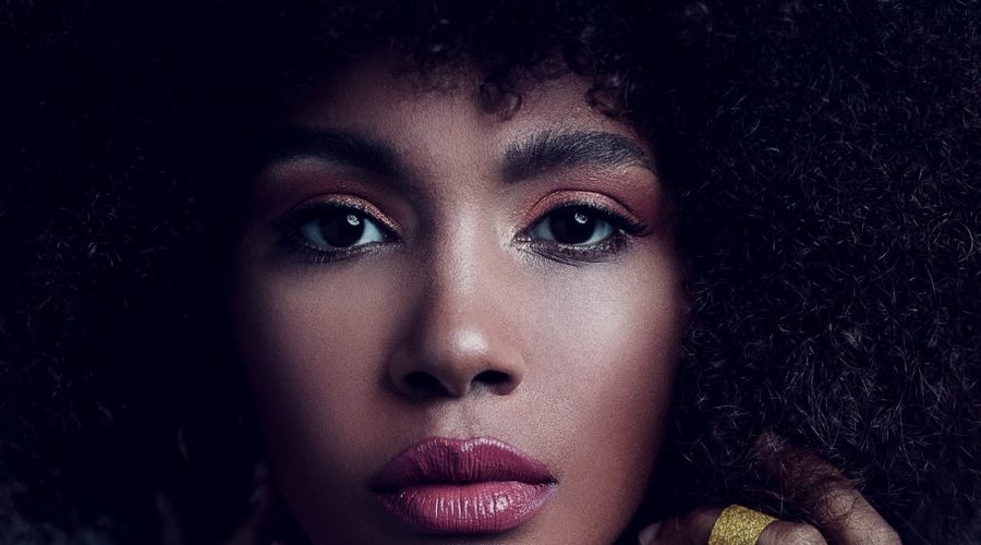 gorgeous young black woman with afro hair
