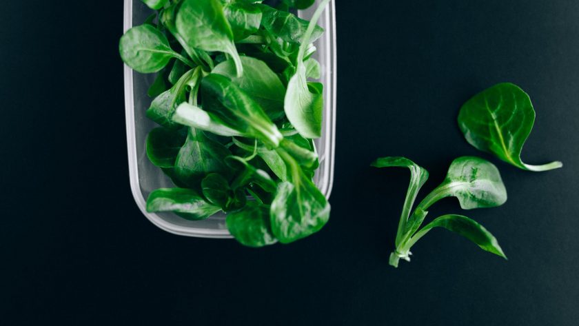 leafy vegetables on a plastic container