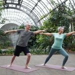 couple practicing yoga